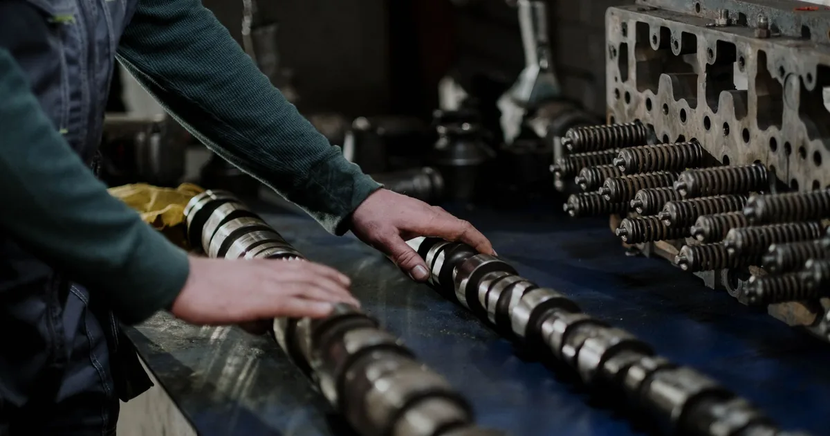 Machine parts dismantled for maintenance and repair in an industrial workshop