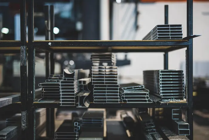 A stack of steel sections in a warehouse