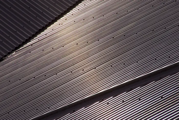 Stacked metal roofing sheets
